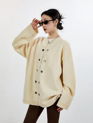 Oversize-Strickjacke mit Rippstrickbündchen, Knopfleiste und Reißverschluss