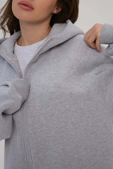 Oversize-Kapuzenpullover mit langen Ärmeln und Reißverschluss in Unifarbe