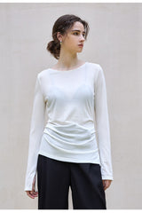 Stilvolles, figurbetontes Baselayer aus Wolle und Tencel mit asymmetrischem Saum