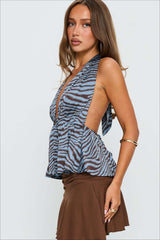 Bluse mit Zebramuster, rückenfrei, Neckholder und Bindegürtel