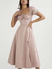 Kleid mit Puffärmeln und Rückenschlitz 