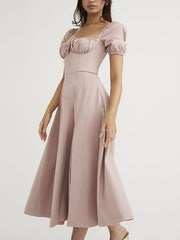 Kleid mit Puffärmeln und Rückenschlitz 