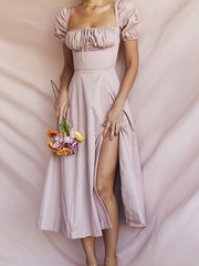 Kleid mit Puffärmeln und Rückenschlitz 